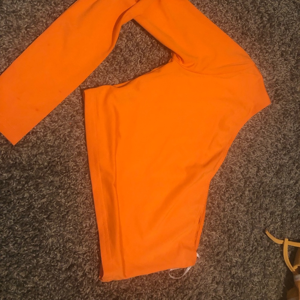 Orange SHEIN shirt , one sleeved and crop top